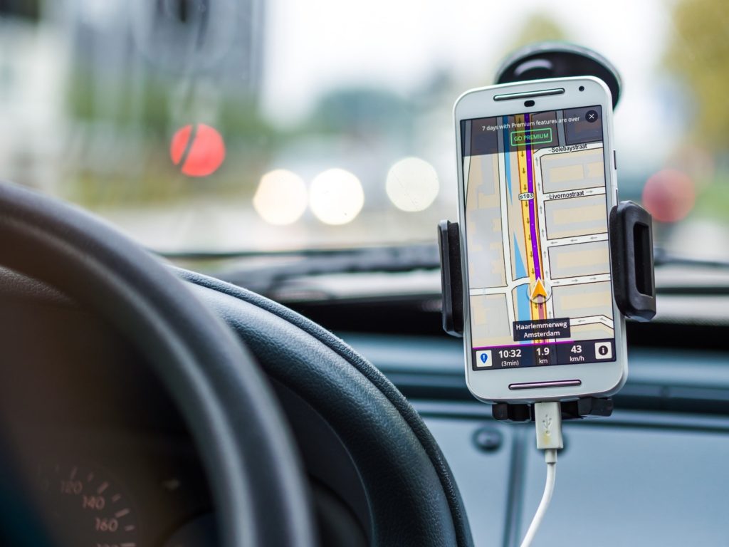 Cellphone with GPS mounted to car dashboard